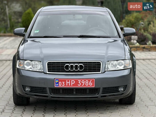Серый Ауди А4, объемом двигателя 2 л и пробегом 220 тыс. км за 5950 $, фото 1 на Automoto.ua