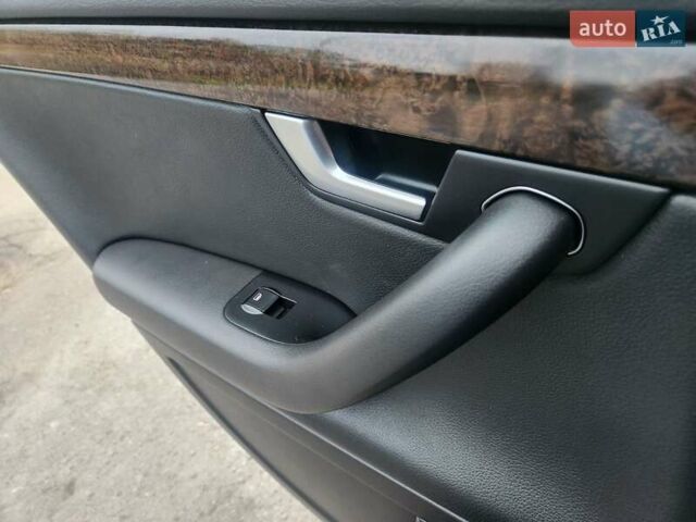 Серый Ауди А4, объемом двигателя 2 л и пробегом 200 тыс. км за 6100 $, фото 3 на Automoto.ua