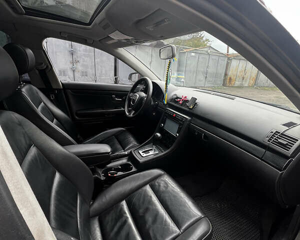 Серый Ауди А4, объемом двигателя 2 л и пробегом 303 тыс. км за 6000 $, фото 4 на Automoto.ua
