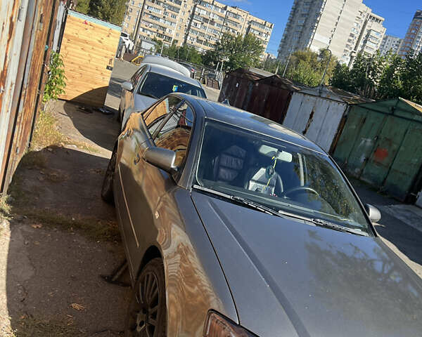 Серый Ауди А4, объемом двигателя 2 л и пробегом 303 тыс. км за 6000 $, фото 3 на Automoto.ua