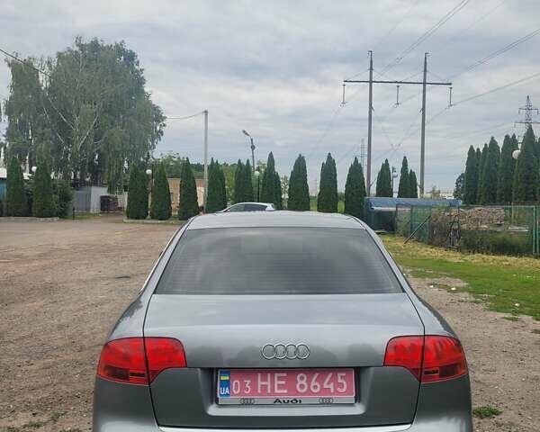 Сірий Ауді А4, об'ємом двигуна 2 л та пробігом 203 тис. км за 6999 $, фото 5 на Automoto.ua