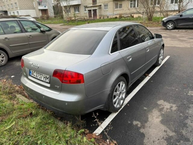 Серый Ауди А4, объемом двигателя 2 л и пробегом 300 тыс. км за 6500 $, фото 1 на Automoto.ua