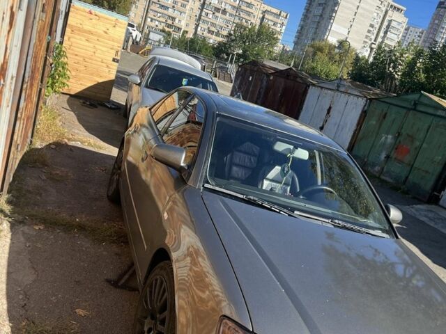 Серый Ауди А4, объемом двигателя 2 л и пробегом 303 тыс. км за 6000 $, фото 1 на Automoto.ua