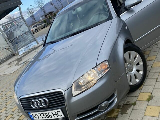 Серый Ауди А4, объемом двигателя 2 л и пробегом 300 тыс. км за 8000 $, фото 1 на Automoto.ua