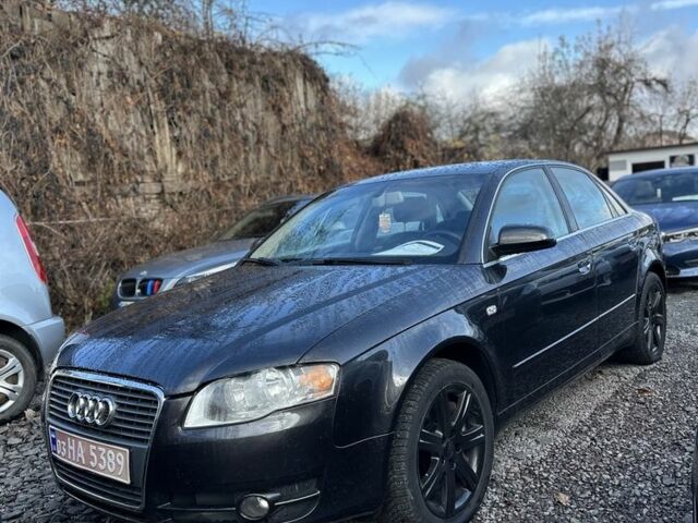 Серый Ауди А4, объемом двигателя 2 л и пробегом 261 тыс. км за 6450 $, фото 1 на Automoto.ua