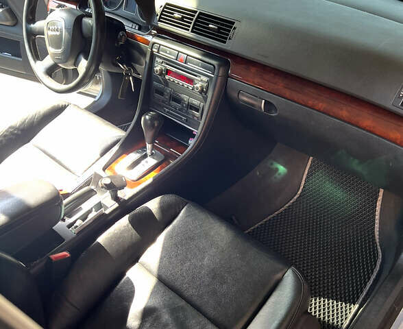 Серый Ауди А4, объемом двигателя 1.78 л и пробегом 295 тыс. км за 7500 $, фото 12 на Automoto.ua