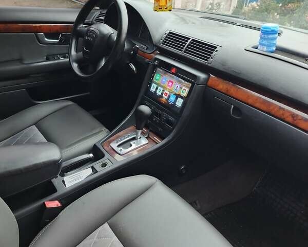 Сірий Ауді А4, об'ємом двигуна 2 л та пробігом 300 тис. км за 6700 $, фото 2 на Automoto.ua