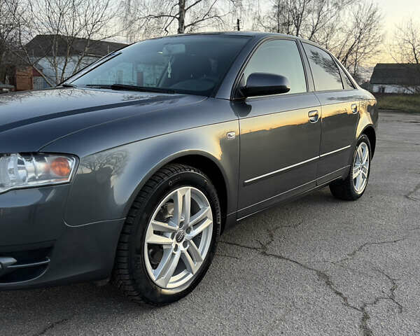 Серый Ауди А4, объемом двигателя 2 л и пробегом 215 тыс. км за 7800 $, фото 2 на Automoto.ua