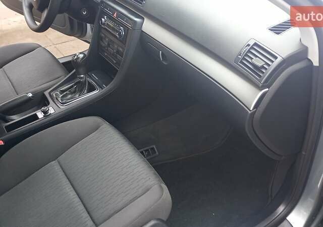 Серый Ауди А4, объемом двигателя 2 л и пробегом 218 тыс. км за 6600 $, фото 4 на Automoto.ua