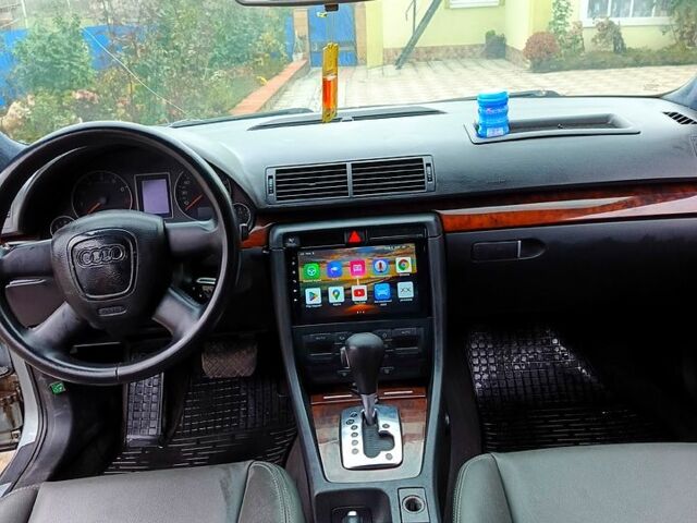 Серый Ауди А4, объемом двигателя 2 л и пробегом 300 тыс. км за 6700 $, фото 7 на Automoto.ua