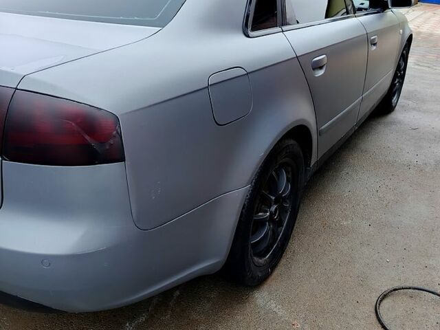 Серый Ауди А4, объемом двигателя 2 л и пробегом 300 тыс. км за 6700 $, фото 8 на Automoto.ua