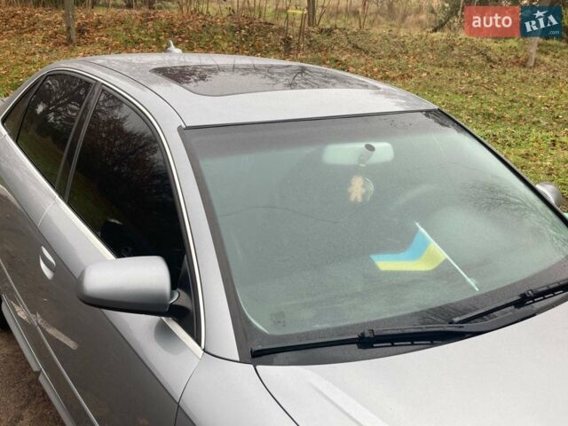 Серый Ауди А4, объемом двигателя 2 л и пробегом 304 тыс. км за 7000 $, фото 6 на Automoto.ua