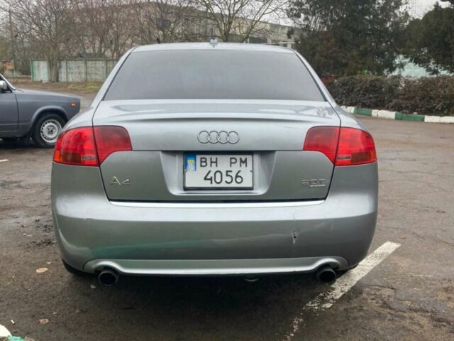 Серый Ауди А4, объемом двигателя 2 л и пробегом 304 тыс. км за 7000 $, фото 4 на Automoto.ua