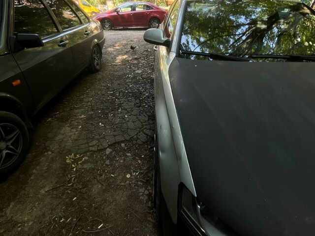 Серый Ауди А4, объемом двигателя 2 л и пробегом 305 тыс. км за 5599 $, фото 6 на Automoto.ua