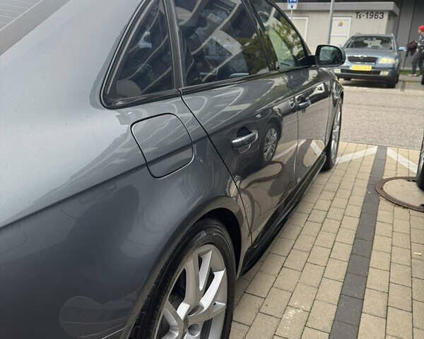 Сірий Ауді А4, об'ємом двигуна 2 л та пробігом 312 тис. км за 9999 $, фото 3 на Automoto.ua
