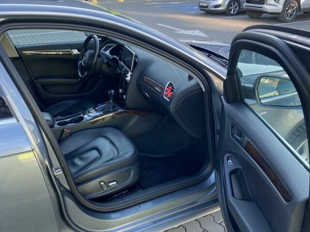 Сірий Ауді А4, об'ємом двигуна 2 л та пробігом 128 тис. км за 14999 $, фото 10 на Automoto.ua