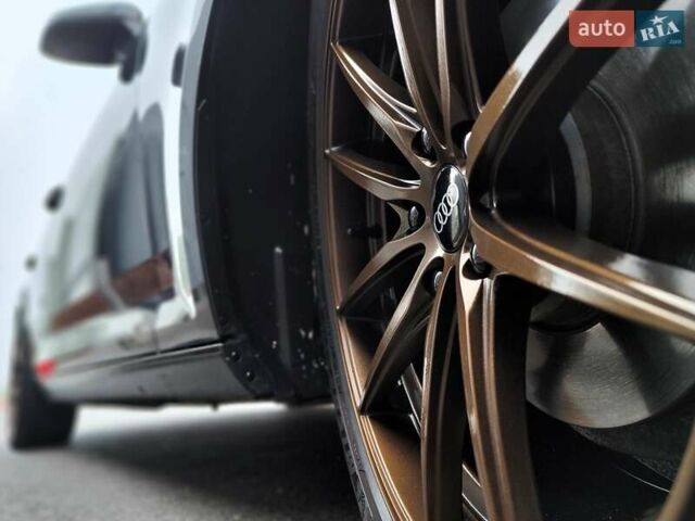 Серый Ауди А4, объемом двигателя 2 л и пробегом 128 тыс. км за 15990 $, фото 31 на Automoto.ua