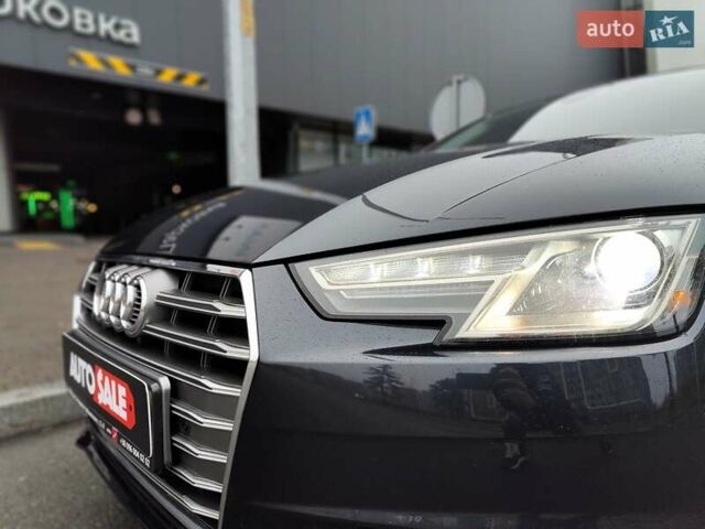 Серый Ауди А4, объемом двигателя 2 л и пробегом 128 тыс. км за 15990 $, фото 1 на Automoto.ua