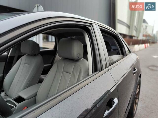 Серый Ауди А4, объемом двигателя 2 л и пробегом 128 тыс. км за 15990 $, фото 3 на Automoto.ua