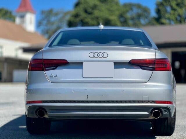 Сірий Ауді А4, об'ємом двигуна 2 л та пробігом 61 тис. км за 15500 $, фото 6 на Automoto.ua