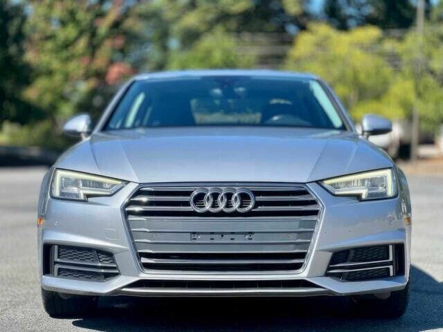 Сірий Ауді А4, об'ємом двигуна 2 л та пробігом 61 тис. км за 15500 $, фото 1 на Automoto.ua