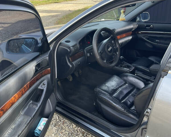 Серый Ауди А4, объемом двигателя 1.8 л и пробегом 328 тыс. км за 3800 $, фото 4 на Automoto.ua