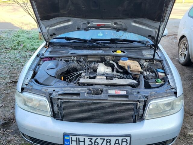 Серый Ауди А4, объемом двигателя 2.5 л и пробегом 474 тыс. км за 3650 $, фото 4 на Automoto.ua