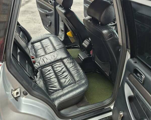 Сірий Ауді А4, об'ємом двигуна 2.5 л та пробігом 391 тис. км за 4100 $, фото 13 на Automoto.ua