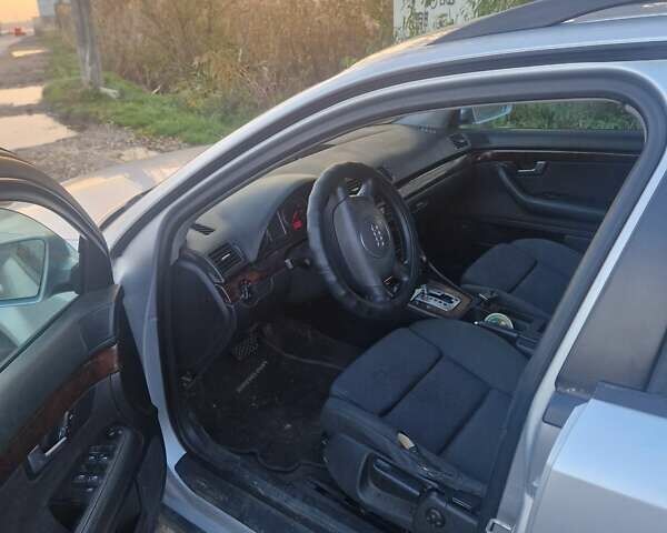 Серый Ауди А4, объемом двигателя 2.5 л и пробегом 418 тыс. км за 3500 $, фото 4 на Automoto.ua