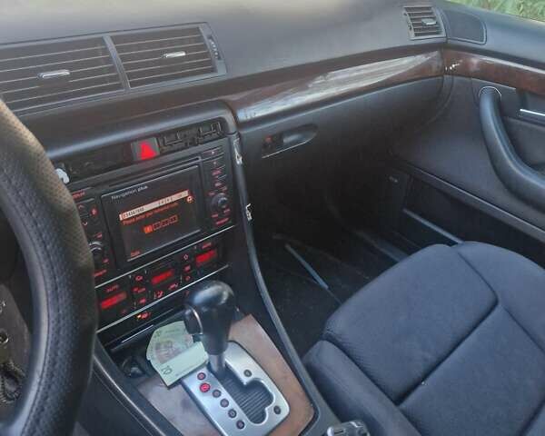 Серый Ауди А4, объемом двигателя 2.5 л и пробегом 418 тыс. км за 3500 $, фото 5 на Automoto.ua