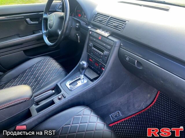 Сірий Ауді А4, об'ємом двигуна 2 л та пробігом 178 тис. км за 5750 $, фото 4 на Automoto.ua