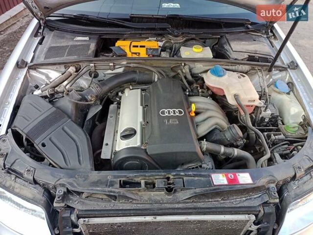 Серый Ауди А4, объемом двигателя 1.6 л и пробегом 214 тыс. км за 5500 $, фото 6 на Automoto.ua