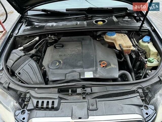 Серый Ауди А4, объемом двигателя 2 л и пробегом 373 тыс. км за 6600 $, фото 4 на Automoto.ua