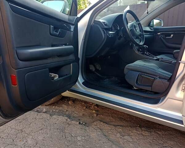 Серый Ауди А4, объемом двигателя 1.6 л и пробегом 214 тыс. км за 5500 $, фото 5 на Automoto.ua