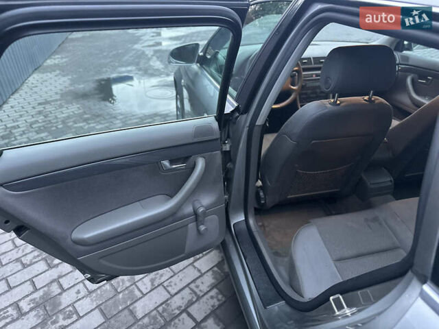 Сірий Ауді А4, об'ємом двигуна 2 л та пробігом 255 тис. км за 5900 $, фото 19 на Automoto.ua