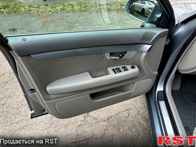 Серый Ауди А4, объемом двигателя 2 л и пробегом 300 тыс. км за 5900 $, фото 1 на Automoto.ua