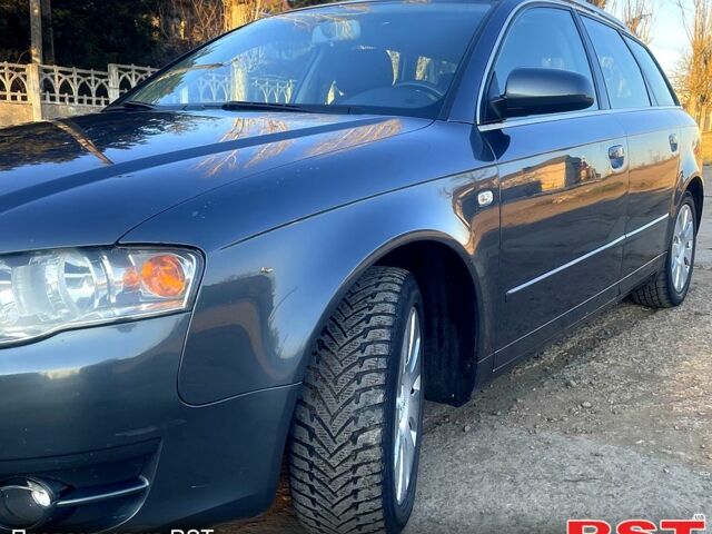 Серый Ауди А4, объемом двигателя 2 л и пробегом 330 тыс. км за 6000 $, фото 1 на Automoto.ua