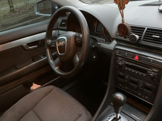 Серый Ауди А4, объемом двигателя 2 л и пробегом 310 тыс. км за 5400 $, фото 6 на Automoto.ua