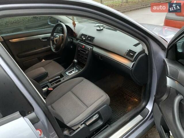 Серый Ауди А4, объемом двигателя 2 л и пробегом 310 тыс. км за 5400 $, фото 4 на Automoto.ua