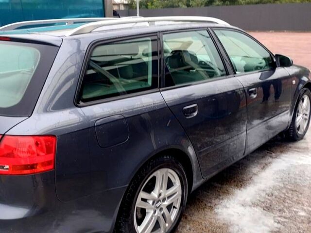 Сірий Ауді А4, об'ємом двигуна 2 л та пробігом 241 тис. км за 7000 $, фото 4 на Automoto.ua