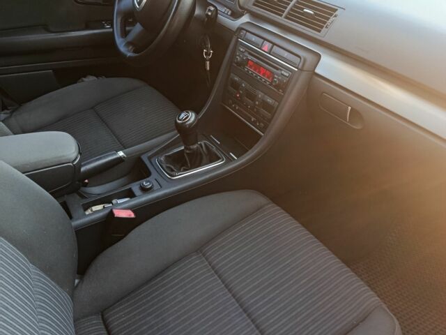 Серый Ауди А4, объемом двигателя 2 л и пробегом 295 тыс. км за 6690 $, фото 1 на Automoto.ua