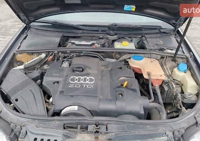 Серый Ауди А4, объемом двигателя 2 л и пробегом 313 тыс. км за 6700 $, фото 3 на Automoto.ua