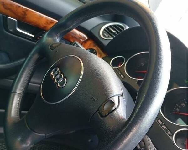 Синий Ауди А4, объемом двигателя 2.5 л и пробегом 248 тыс. км за 5900 $, фото 6 на Automoto.ua