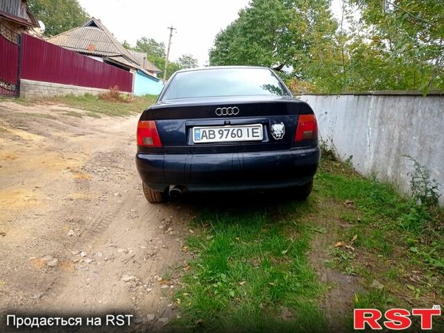 Синий Ауди А4, объемом двигателя 1.8 л и пробегом 265 тыс. км за 3699 $, фото 5 на Automoto.ua