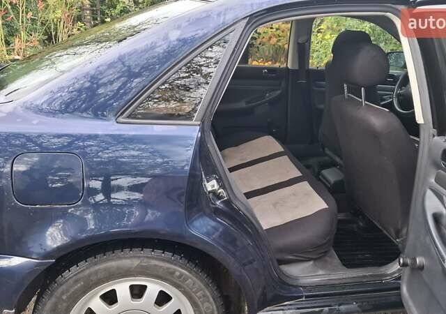 Синий Ауди А4, объемом двигателя 1.8 л и пробегом 310 тыс. км за 3300 $, фото 5 на Automoto.ua