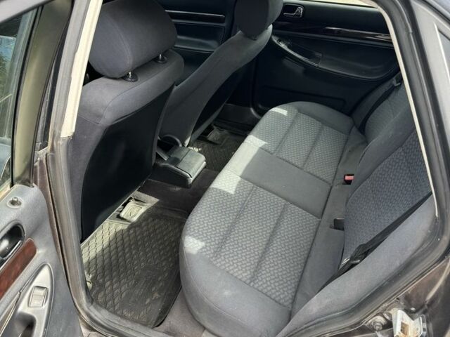 Синий Ауди А4, объемом двигателя 1.8 л и пробегом 303 тыс. км за 2200 $, фото 4 на Automoto.ua