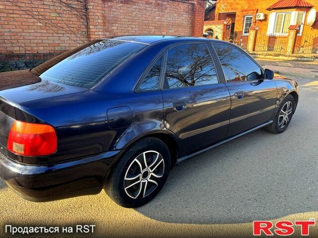 Синий Ауди А4, объемом двигателя 1.6 л и пробегом 280 тыс. км за 3300 $, фото 6 на Automoto.ua