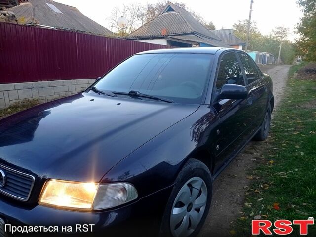 Синий Ауди А4, объемом двигателя 1.8 л и пробегом 265 тыс. км за 3699 $, фото 3 на Automoto.ua