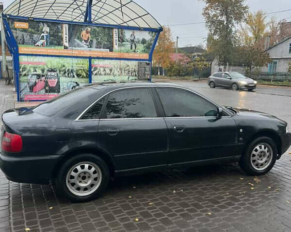 Синий Ауди А4, объемом двигателя 2.6 л и пробегом 330 тыс. км за 2700 $, фото 3 на Automoto.ua
