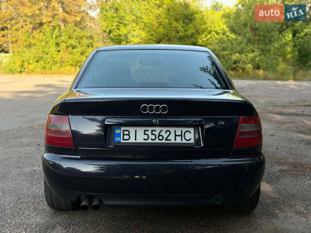 Синий Ауди А4, объемом двигателя 2.6 л и пробегом 348 тыс. км за 3800 $, фото 9 на Automoto.ua